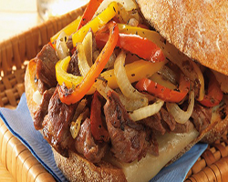 Philly-Style Steak Sandwiches with Grilled Onions and Provolone