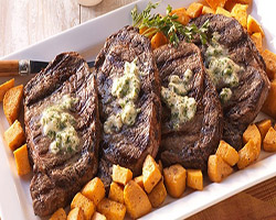 Rib Eyes with Horseradish Butter and Dijon Sweet Potatoes